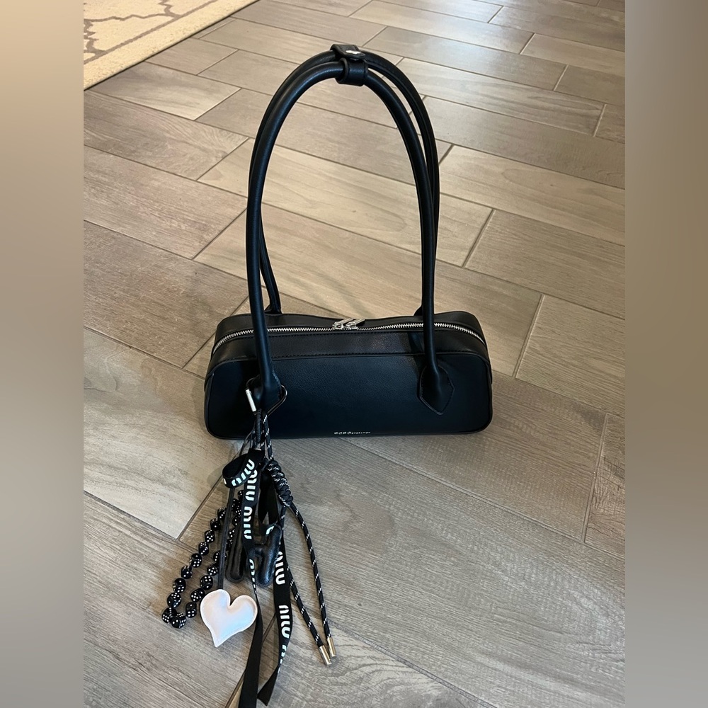 Black shoulder bag Handbag with black white bag charm tassle